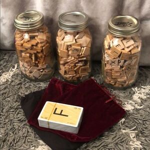 Scrabble pieces hundreds in jars